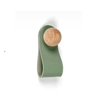 Elegant leather cabinet loop handles with natural wood fixings, available in various pastel and earthy colors for modern interior design.