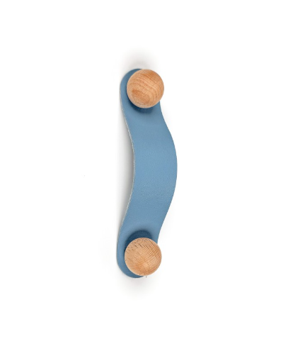 Elegant leather cabinet loop handles with natural wood fixings, available in various pastel and earthy colors for modern interior design.